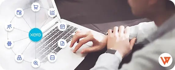 User on laptop exploring top Xero integrations, showcasing key add-ons to boost efficiency and automate workflows.